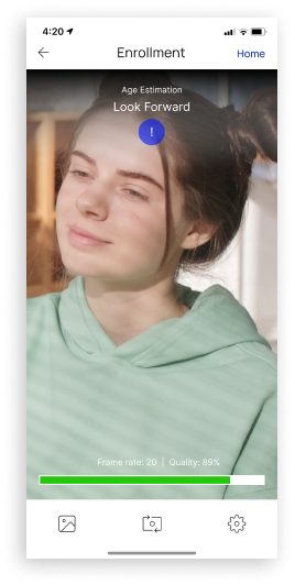 Mobile phone screen showing a young woman completing a guided selfie capture for biometric age estimation, with quality and frame rate indicators