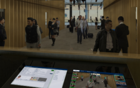 Travelers moving through a terminal while security staff monitor biometric results on a screen in the foreground
