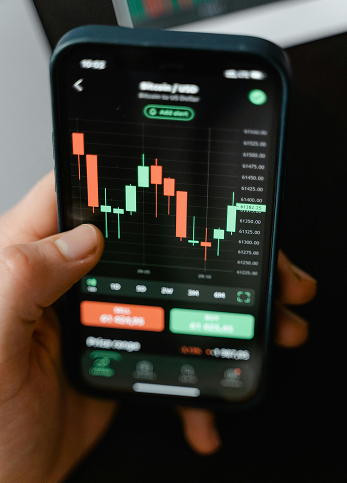 Phone using stock trading app